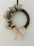 ‘Flora’ Wreath with Gypsophilas and White Statice finished with cream bow 20cm