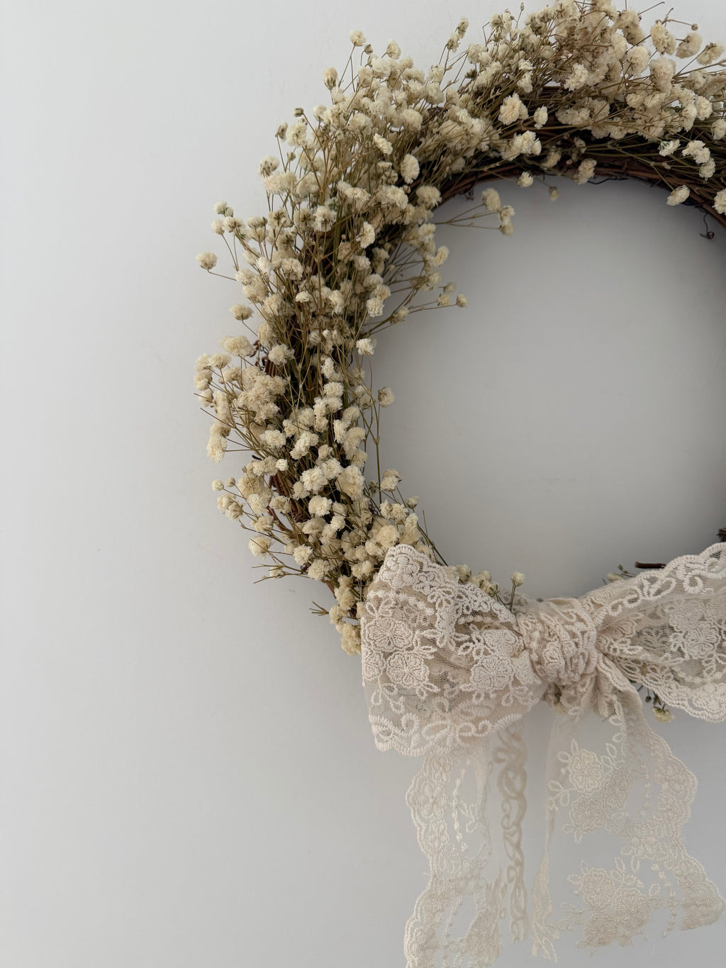 Jazmin’ Gypsophila Wreath finished with a lace bow 30cm