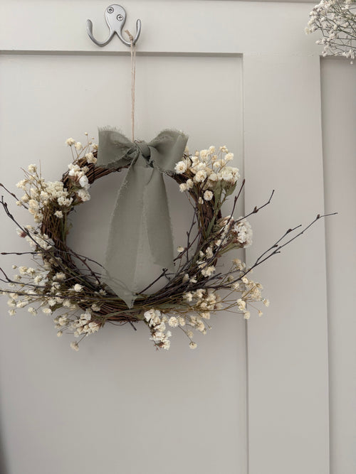 *one off sample* 20cm Wreath with white statice, gypsophilas & dried birch twigs finished with a sage bow
