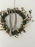 ‘Meadow’ Wreath with White Statice and Ruscus finished with a dark brown gingham bow