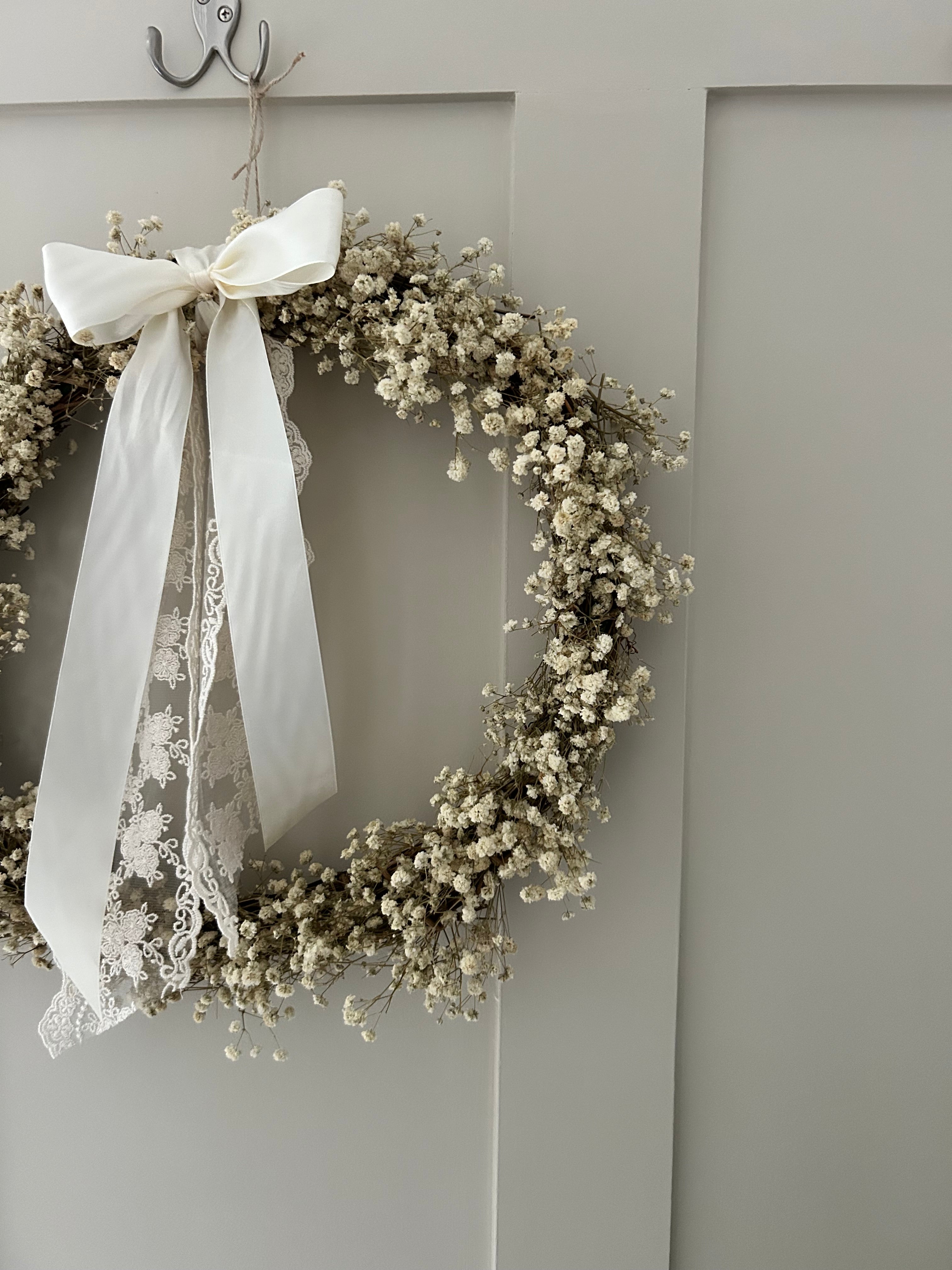 ‘Aurora’ Gypsophila Wreath finished with a cream satin & lace bow