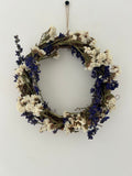 ‘Violet’ Wreath with White Statice and Dark Purple Delphiniums 20cm