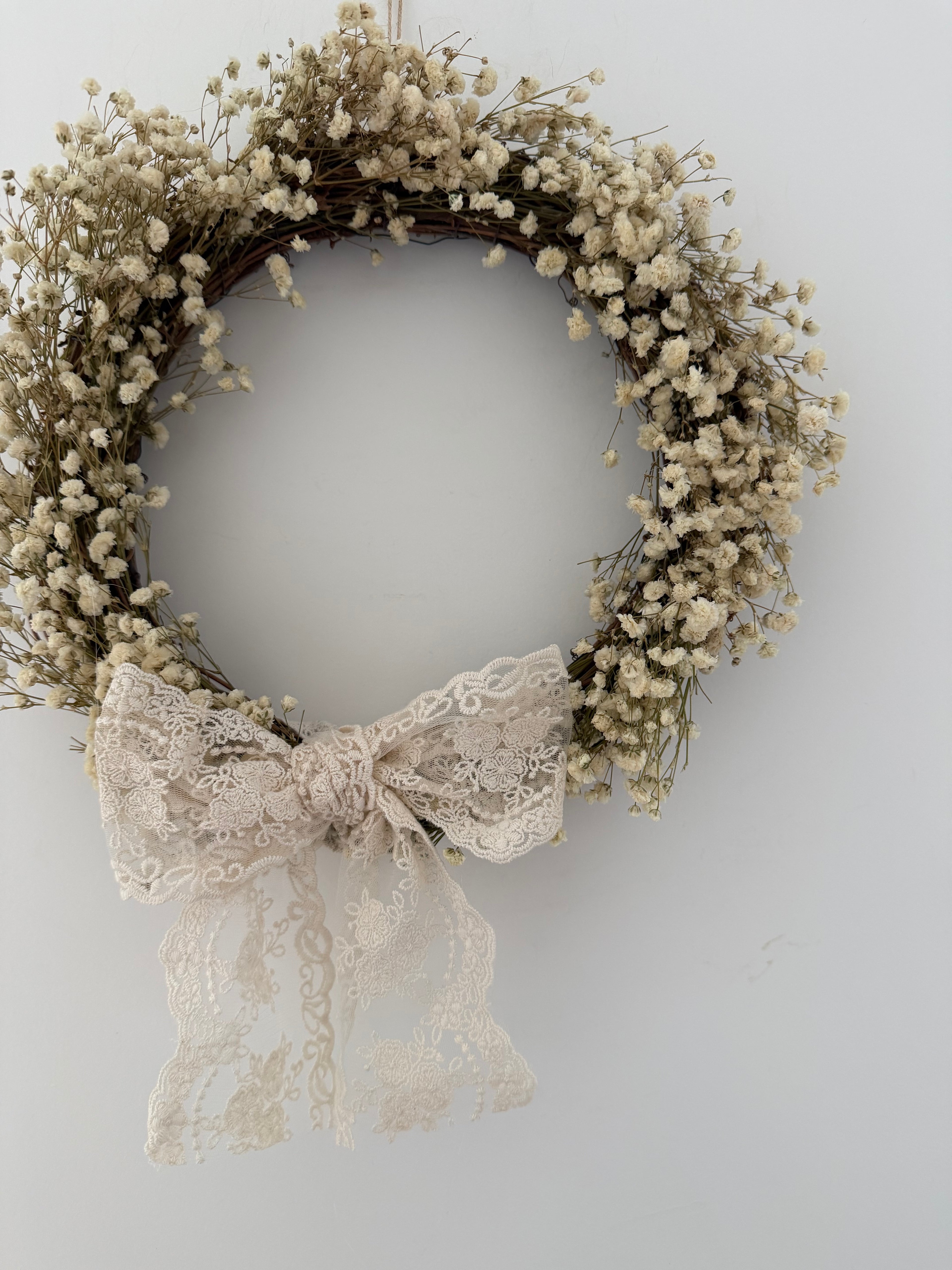 Jazmin’ Gypsophila Wreath finished with a lace bow 30cm