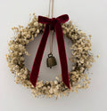 ‘Scarlett’ Christmas Gypsophilas Wreath finished with a red velvet bow & bell