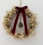 ‘Scarlett’ Christmas Gypsophilas Wreath finished with a red velvet bow & bell