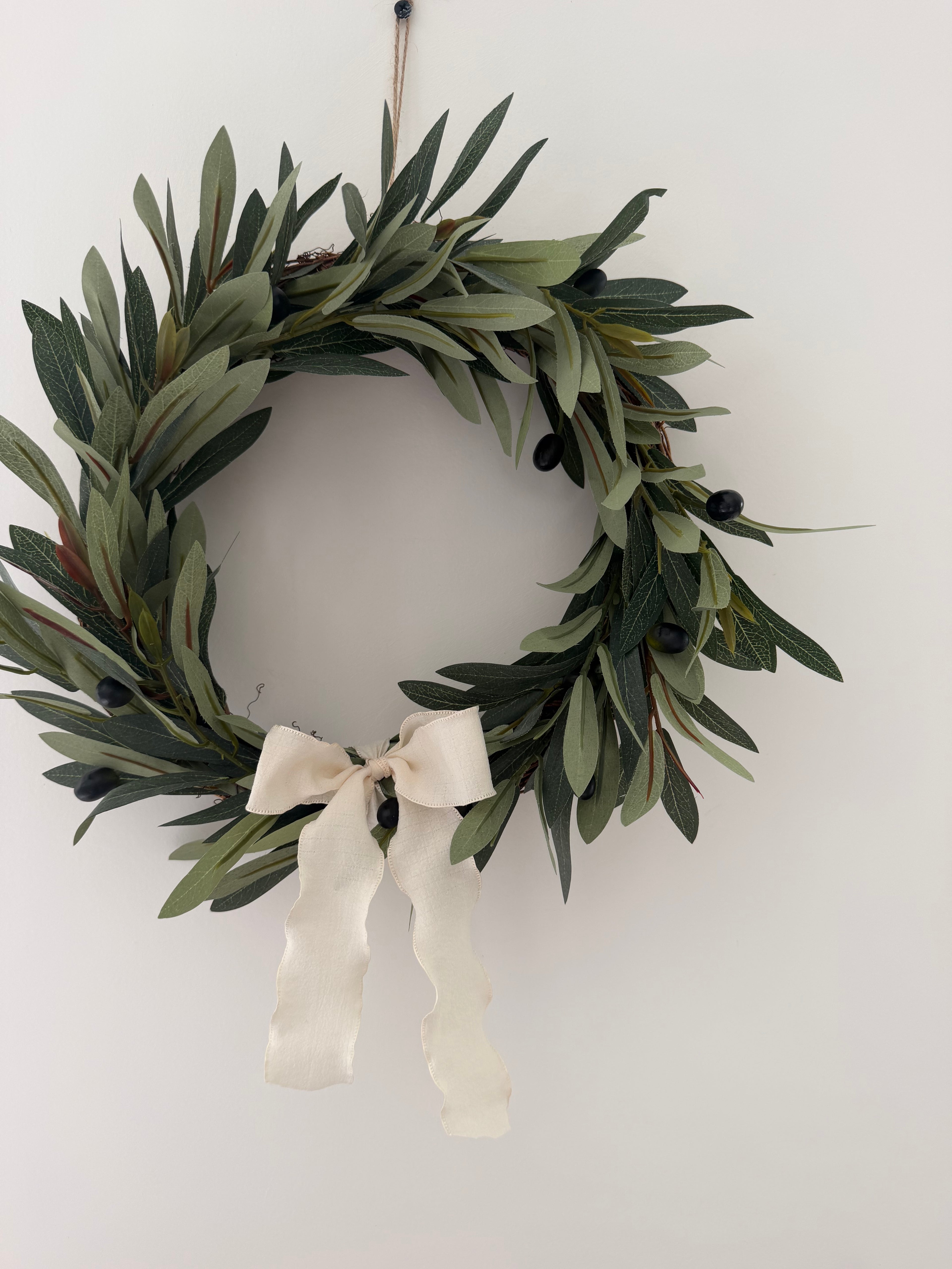 Faux Olive Wreath finished with ivory bow 30cm