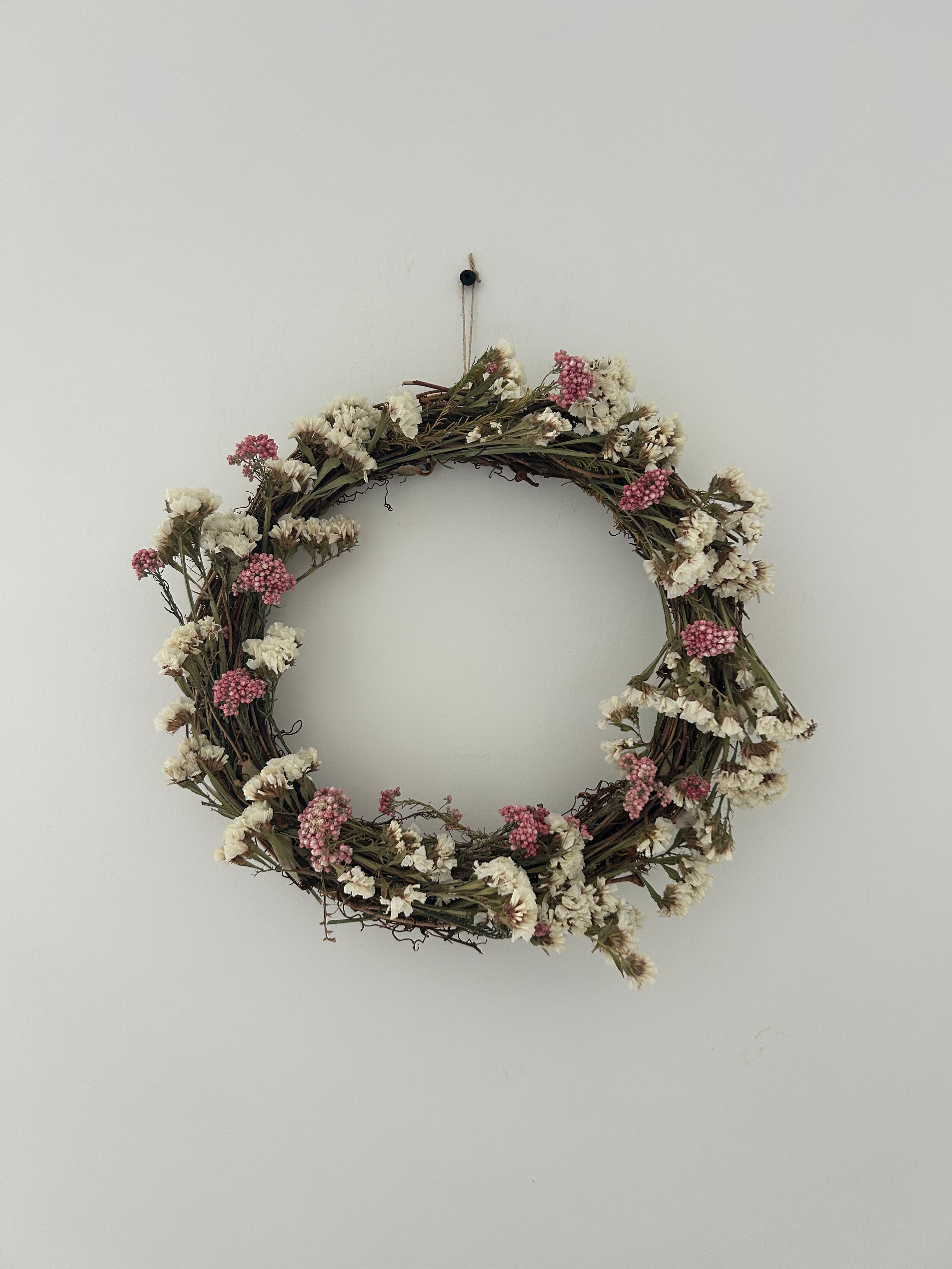 Blossom’ Wreath with White Statice and pink rice flowers