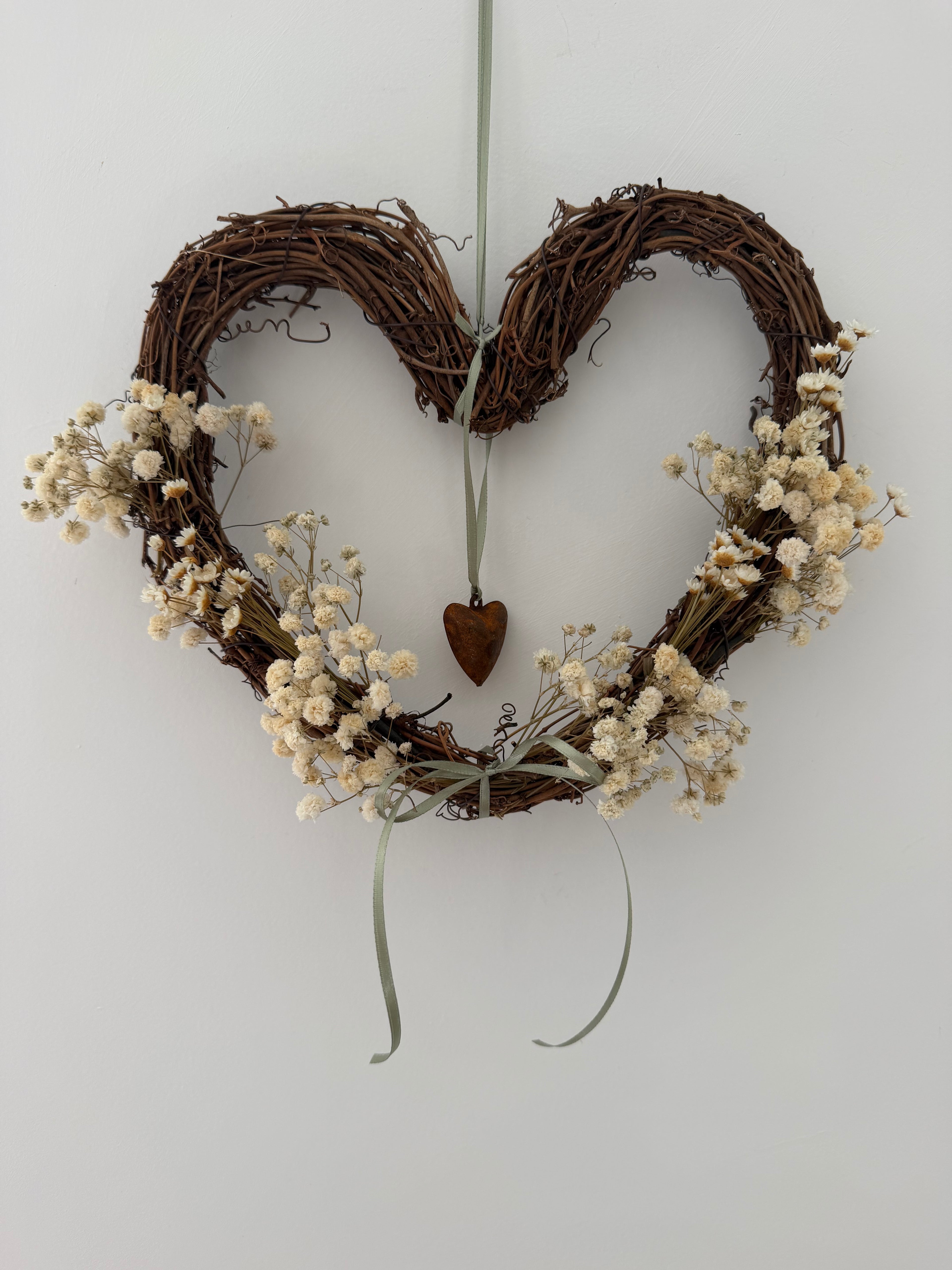 Heart Wreath 25cm with heart bell, sage ribbon, gypsophilas and star flowers