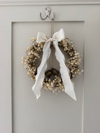 ‘Lux’ Wreath Gypsophilas finished with bells and ivory ribbon