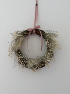 Lois’ Wreath with Gypsophilas and Cotinus coggygria finished with a pink bow 20cm