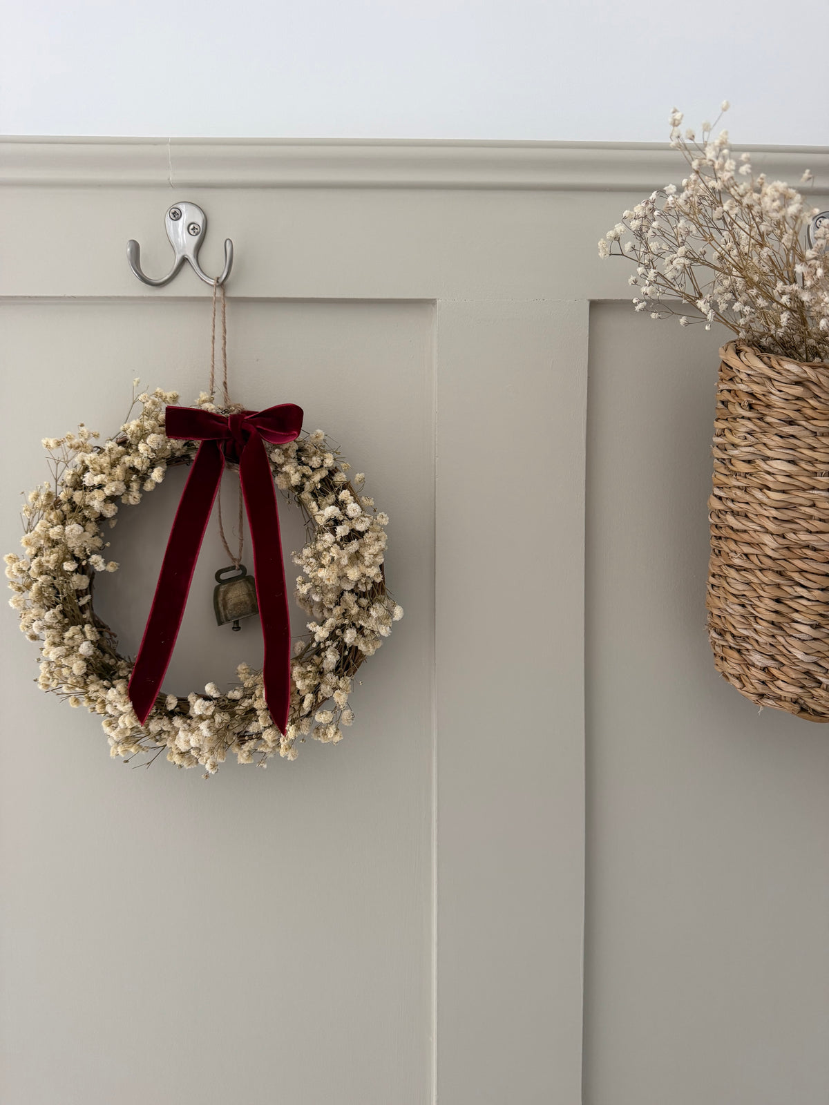 ‘Scarlett’ Christmas Gypsophilas Wreath finished with a red velvet bow & bell