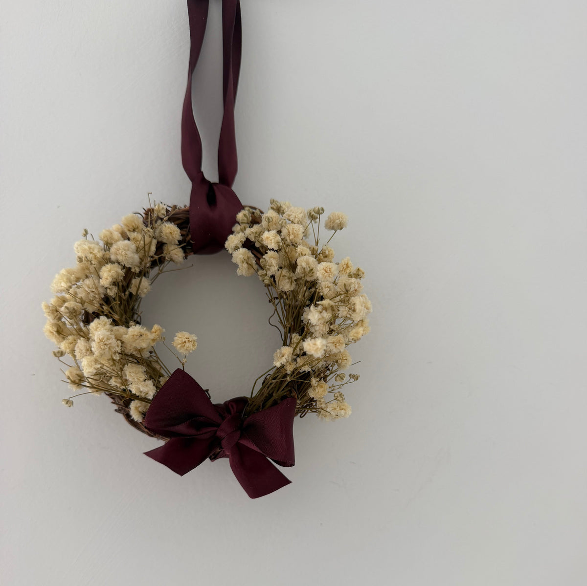 Mini Autumn Wreath with a burgundy bow 10cm