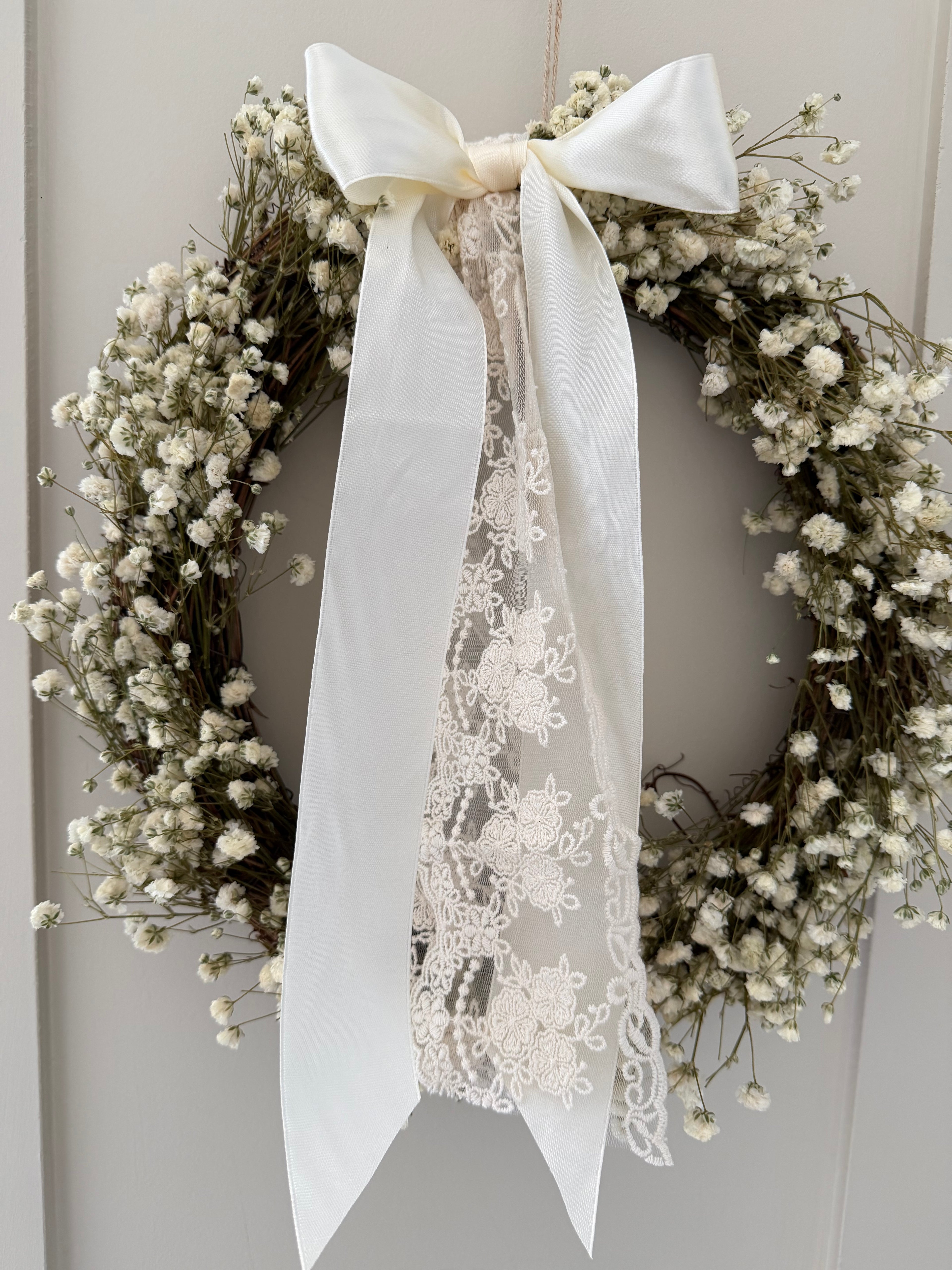 ‘Aurora’ Gypsophila Wreath finished with a cream satin & lace bow 30cm